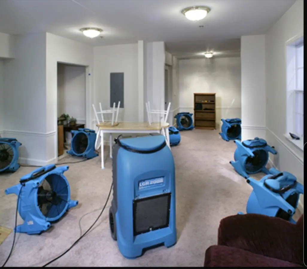 Air movers and dehumidifier setup for Water Damage Restoration in Vidor